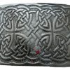 A square chrome belt buckle featuring an intricate Celtic design, showcasing craftsmanship and elegance in metalwork.