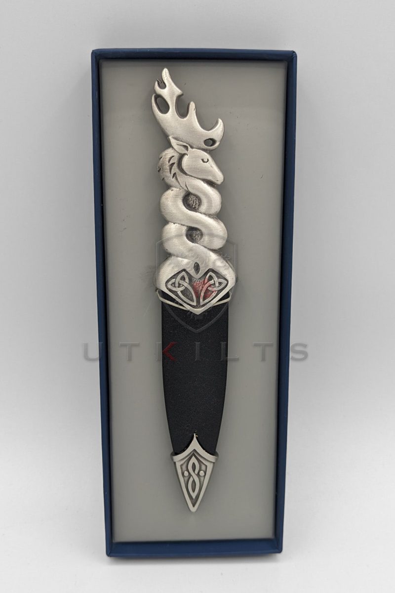 A dragon-adorned knife, the Glenfinnan Stag sgian dubh, showcased in an exquisite box, highlighting its premium craftsmanship.