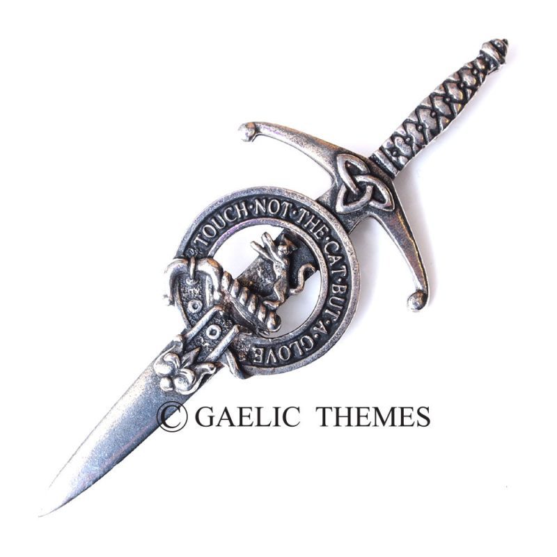 An elegantly designed silver dagger that showcases a Scottish crest, complete with intricate detailing on the handle.