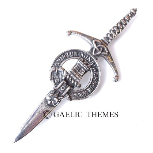 A stunningly crafted silver dagger embellished with a Scottish crest, emphasizing its cultural importance and artistic value.