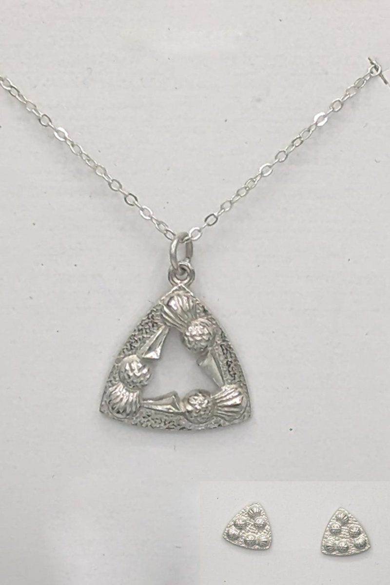 A silver necklace featuring a prominent triangle pendant, elegantly designed and showcased in the image titled Triangular Thistle